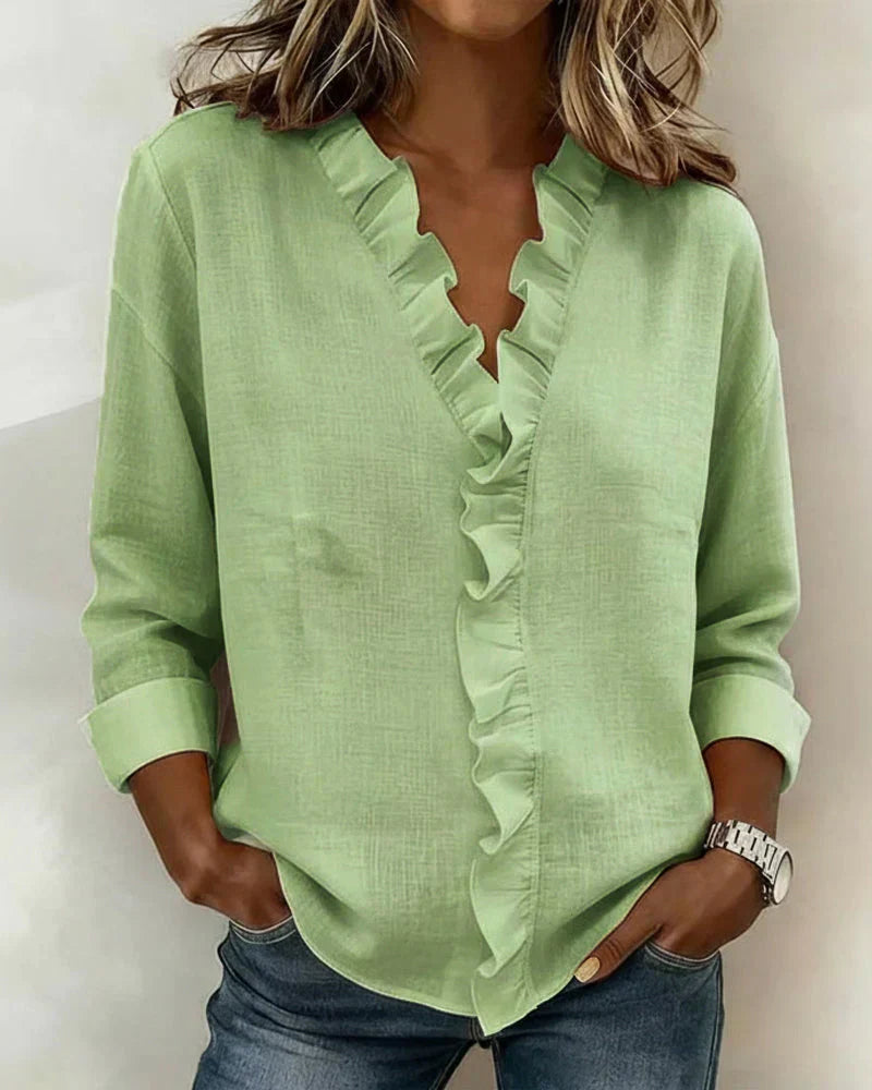 Irene | Blusa elegante con volantes, escote en V y mangas largas